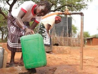 WOC in partnership with Church World Service and the people of Mbangulo built a sand dam and shallow well in a arid region in Kenya. Within one month the lives of those in the community were transformed; they no longer had walk 6 miles and stand in lines for four to five hours to access clean water.